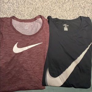 Two plus-size Nike Tees
